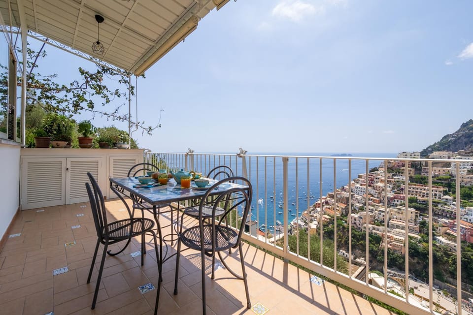 Property building, Patio, View (from property/room), Balcony/Terrace, Dining area, Mountain view, Sea view