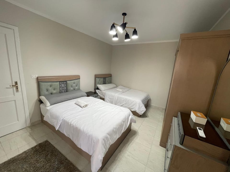 Bed, Photo of the whole room, Bedroom, towels, wardrobe