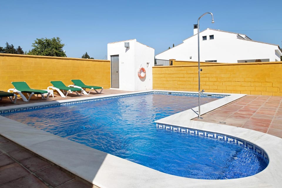 Property building, Living room, Swimming pool