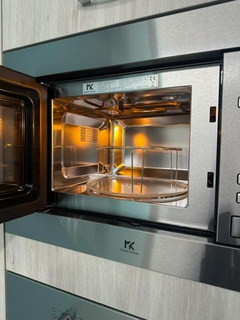 Kitchen or kitchenette, microwave