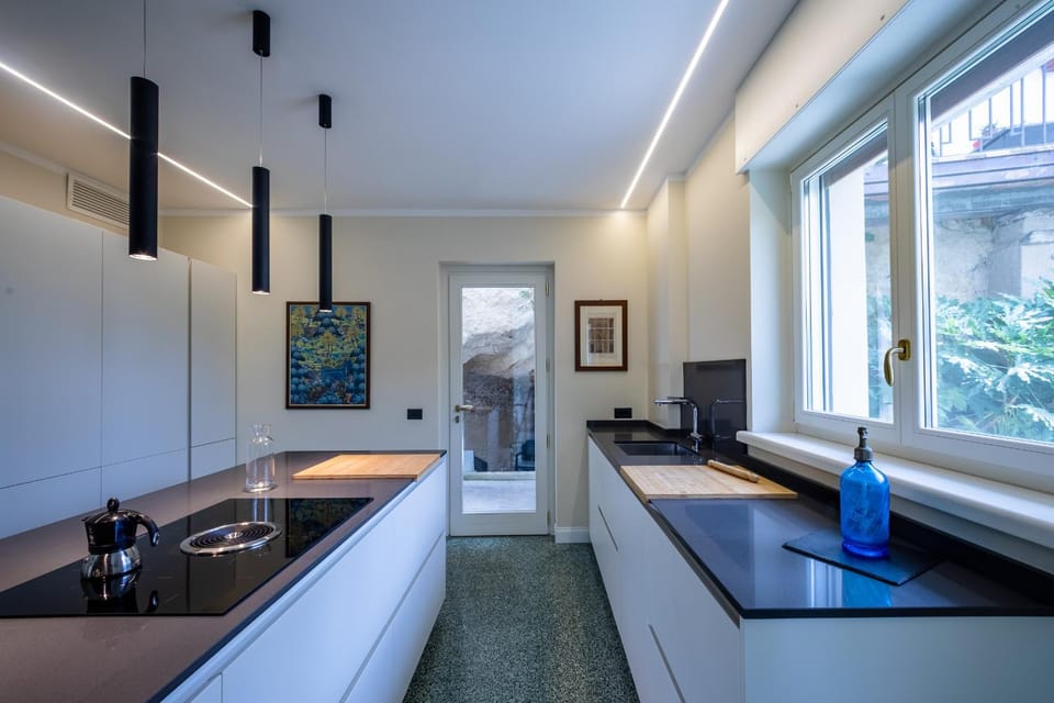 Kitchen or kitchenette, dishwasher, oven, stove