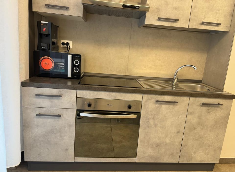 Kitchen or kitchenette, stove