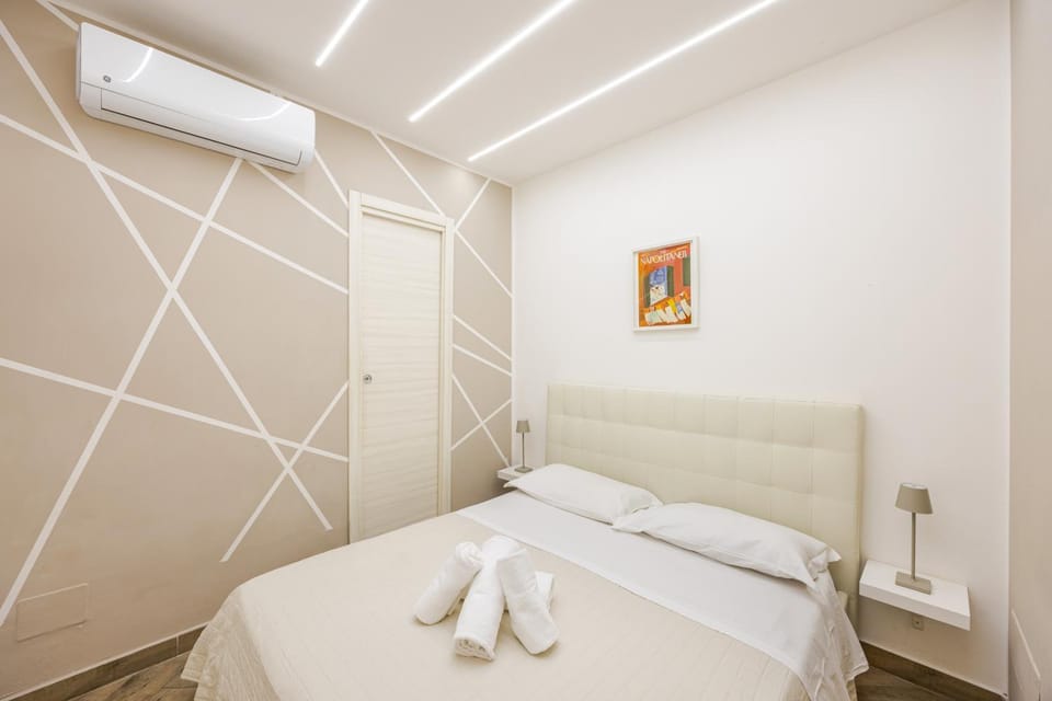Bed, Photo of the whole room, Bedroom, towels, air conditioner