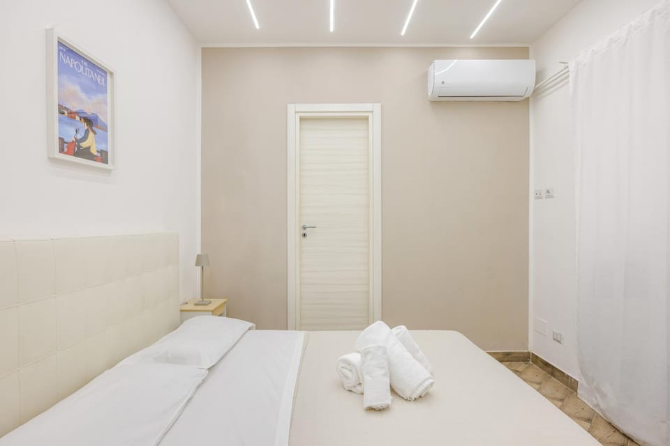 Bed, Photo of the whole room, Bedroom, towels, air conditioner