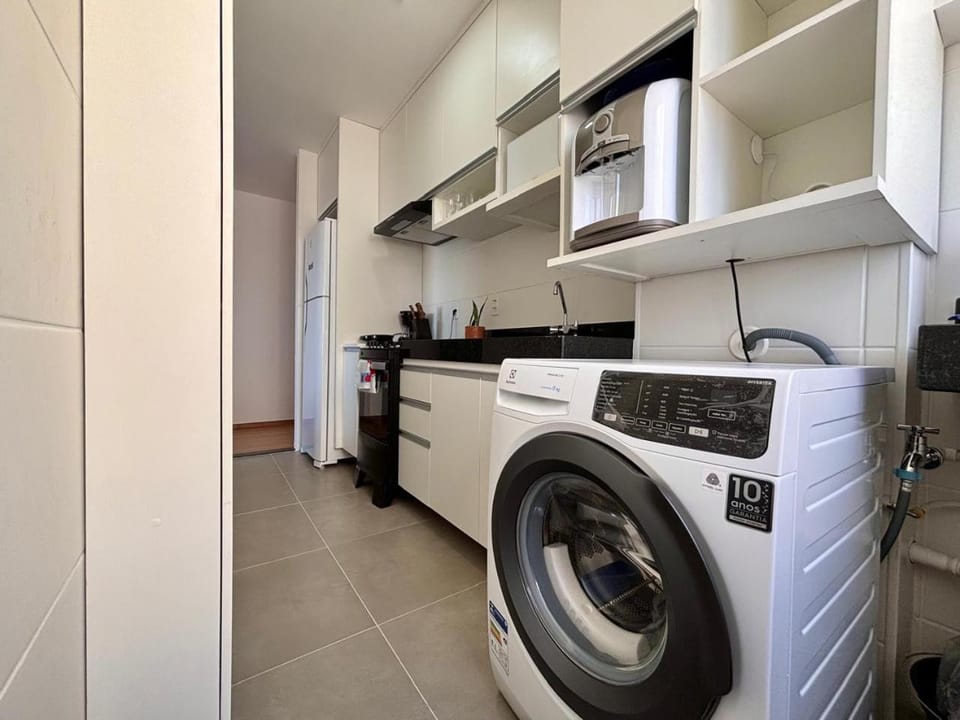 Kitchen or kitchenette, washing machine