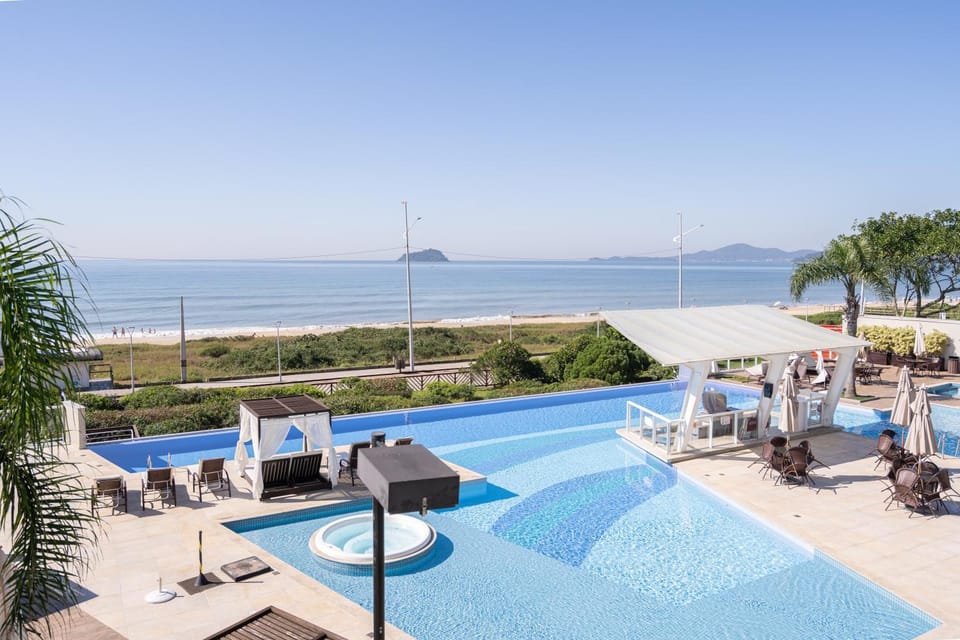 Natural landscape, Beach, Pool view, Swimming pool, sunbed