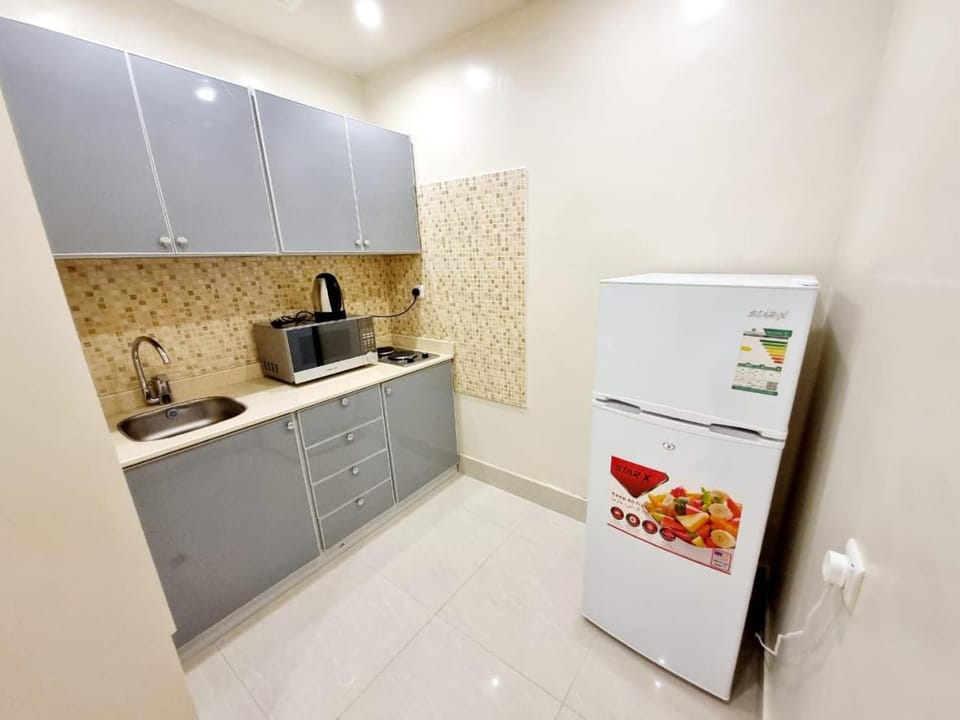 Kitchen or kitchenette, oven, stove