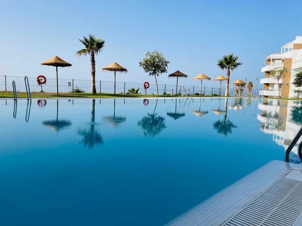 Swimming pool, sunbed