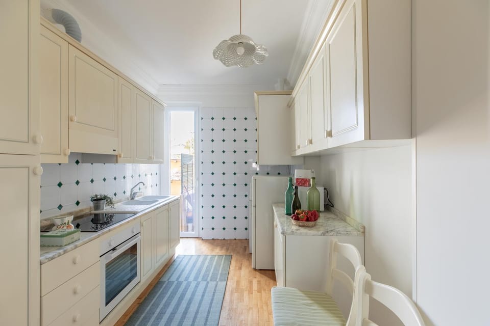 Kitchen or kitchenette, dishwasher, oven, stove, toaster