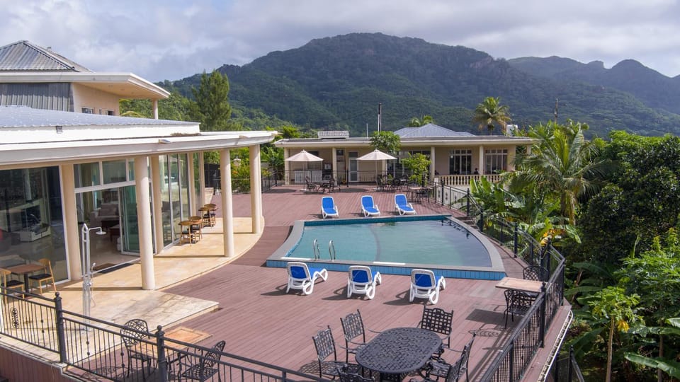 Property building, Pool view, Swimming pool, sunbed