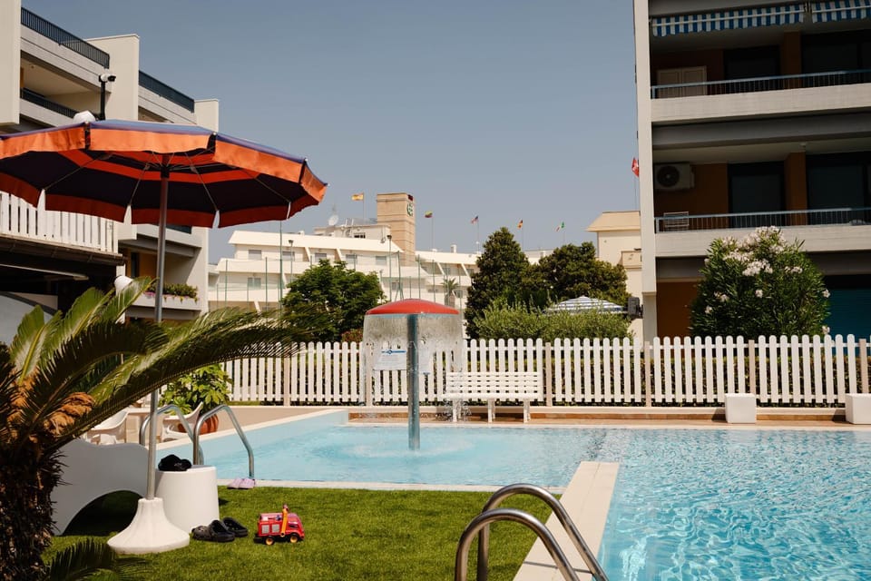 Property building, Patio, Day, Pool view, Swimming pool