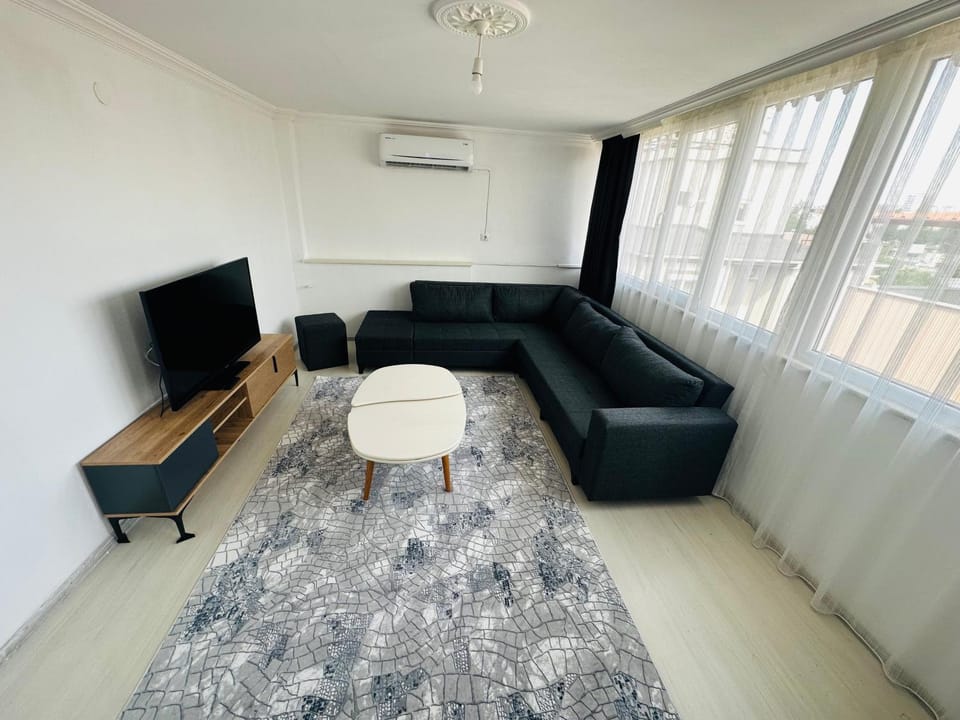 Communal lounge/ TV room, Bed, TV and multimedia, Living room, Photo of the whole room, Seating area, internet, air conditioner