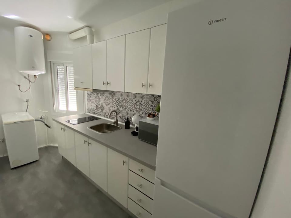Kitchen or kitchenette, stove