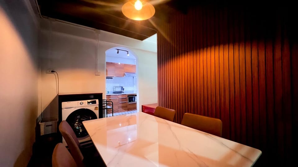 Property building, Restaurant/places to eat, Kitchen or kitchenette, Living room, Seating area, Dining area, minibar, washing machine