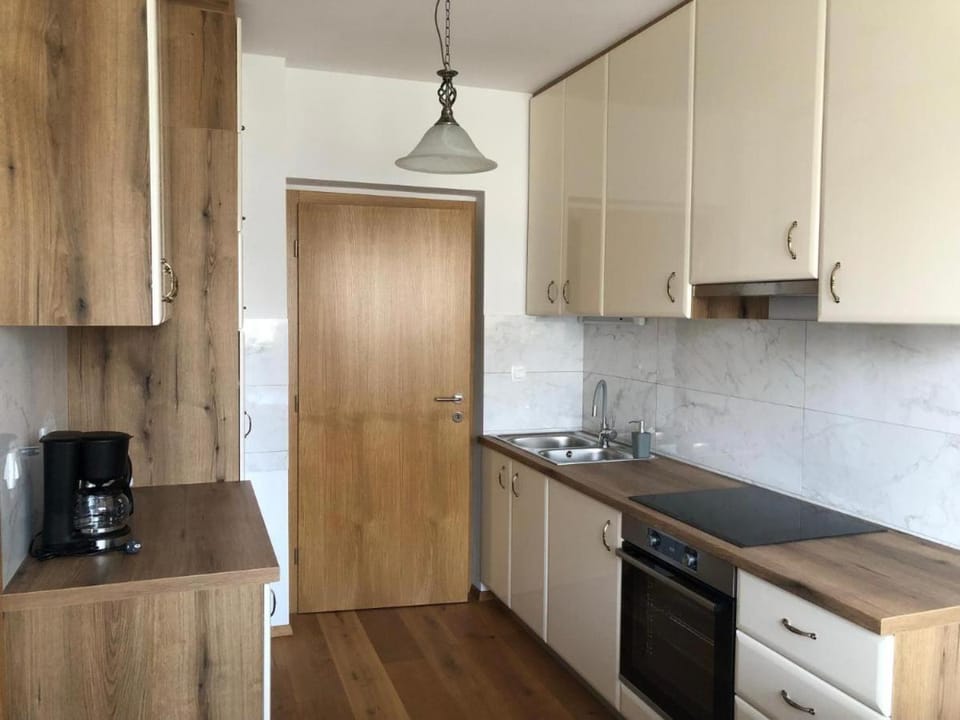 Kitchen or kitchenette, oven