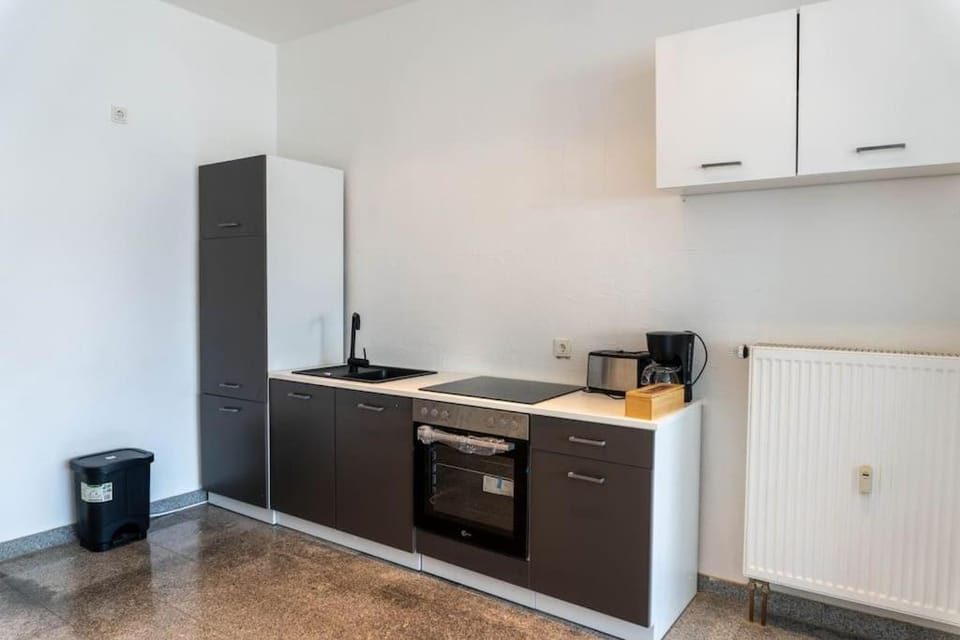 Kitchen or kitchenette, oven, stove