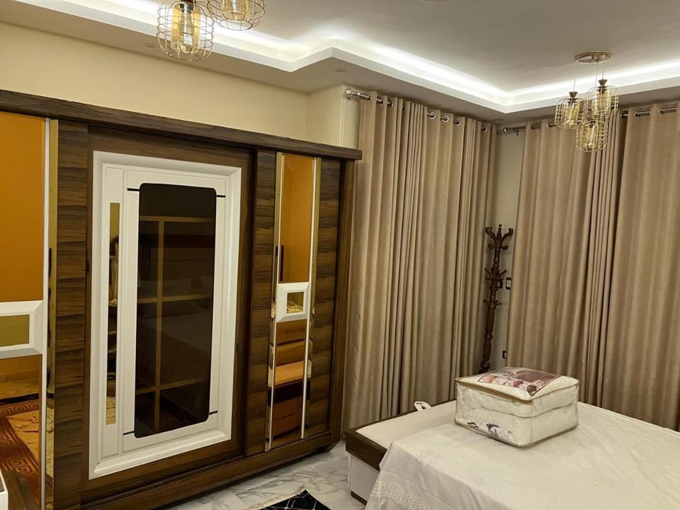 شقة فندقية vip برج رئيسي شارع الغشام مع موقف المنصورة Apartment in Egypt