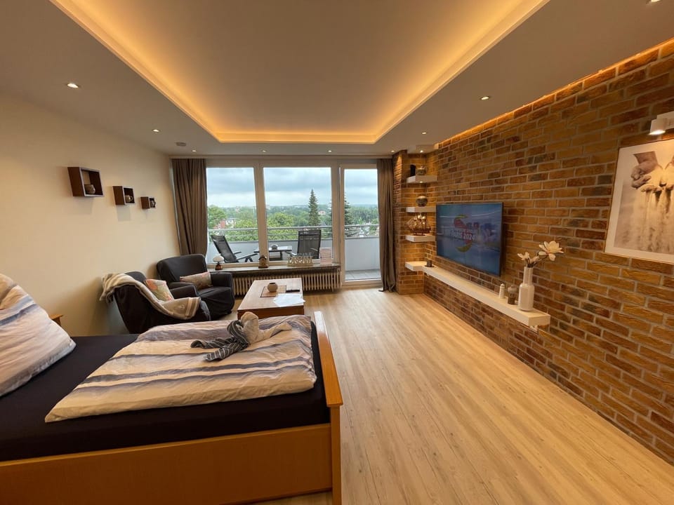 Communal lounge/ TV room, TV and multimedia, Living room, Seating area, Evening entertainment
