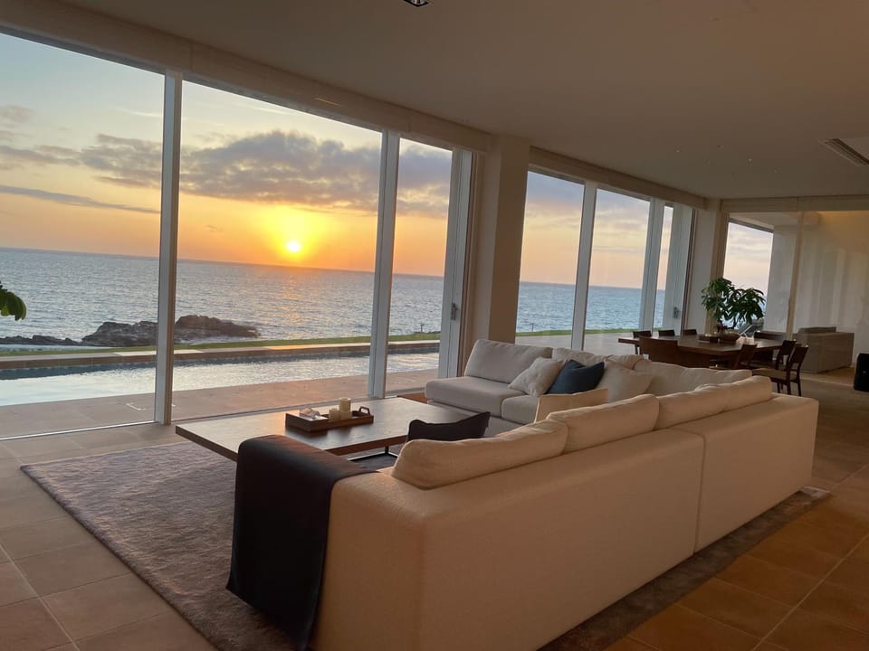 Property building, Patio, Patio, Day, Garden, View (from property/room), Balcony/Terrace, Living room, Photo of the whole room, Decorative detail, Seating area, Dining area, Beach, On site, Garden view, Garden view, Pool view, Sea view, Sea view, Area and facilities, Swimming pool, Swimming pool, Time of day, Location, Sunrise, soundproof