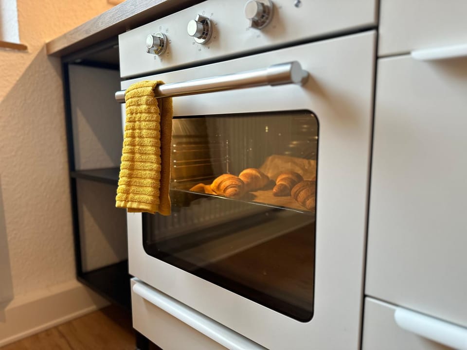 Kitchen or kitchenette, oven