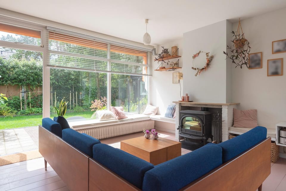 Living room, Seating area, Garden view, fireplace