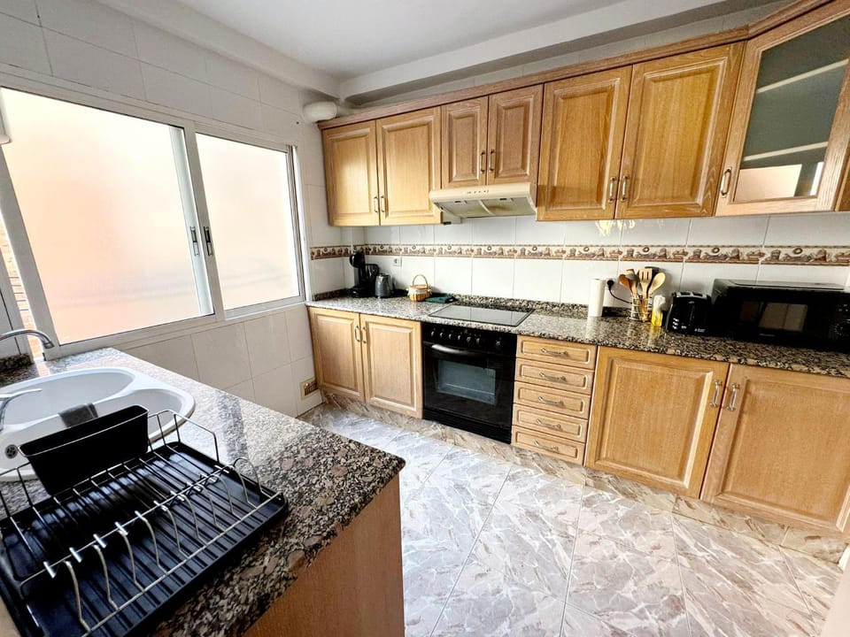 Kitchen or kitchenette, stove, toaster