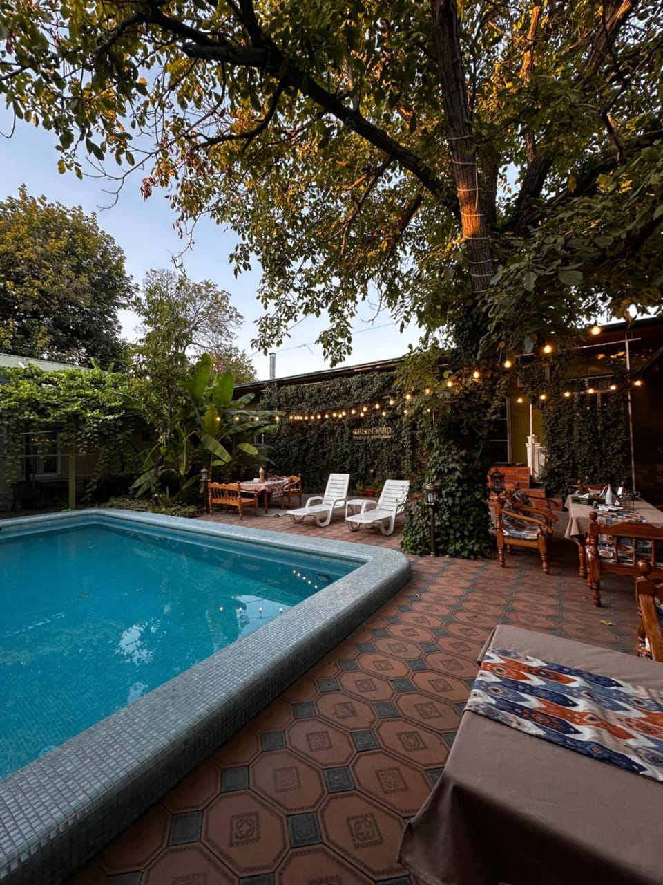 Patio, Natural landscape, Garden, Swimming pool, sunbed