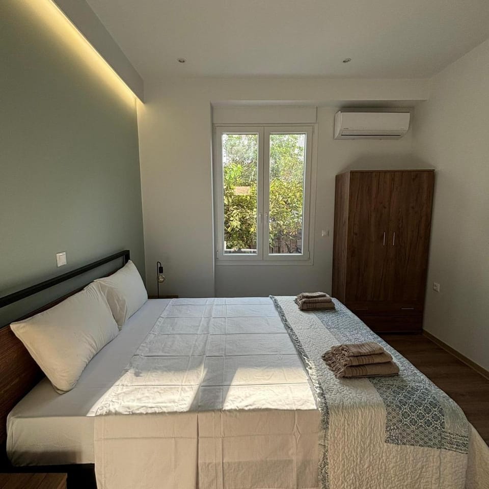 Bed, Bedroom, towels, wardrobe, air conditioner