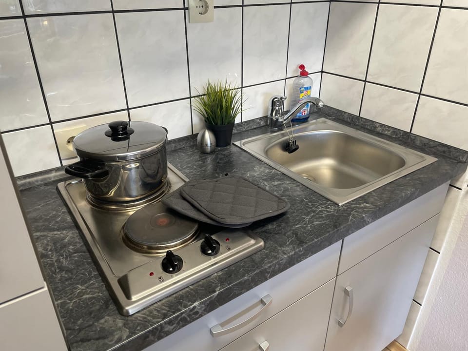 Kitchen or kitchenette, stove
