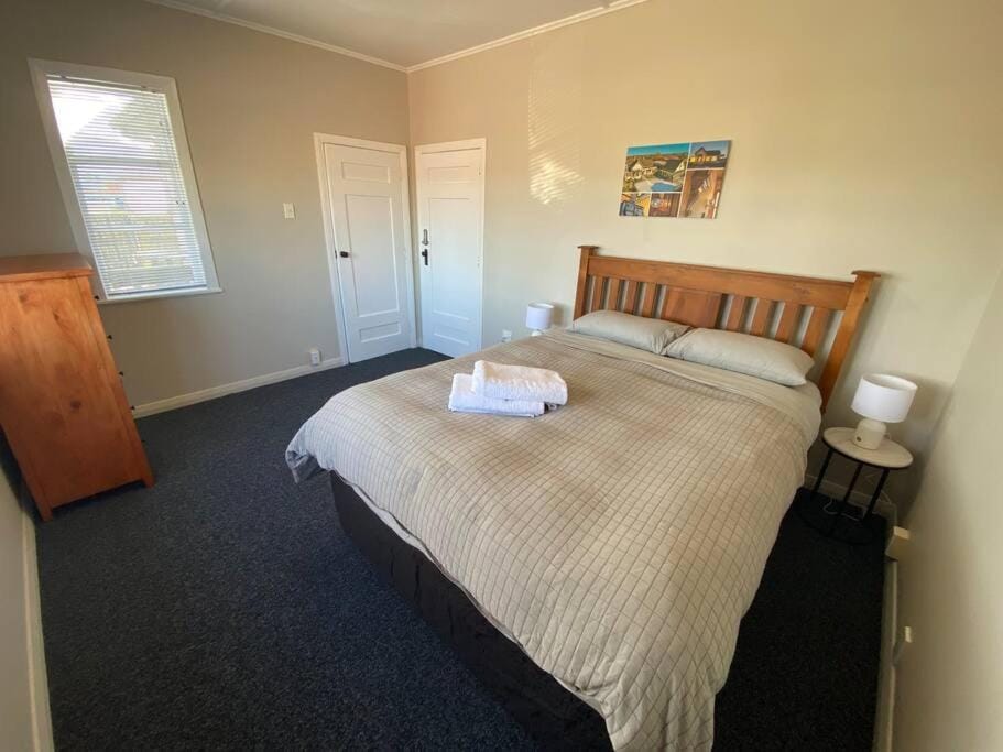 Bed, Photo of the whole room, towels, wardrobe