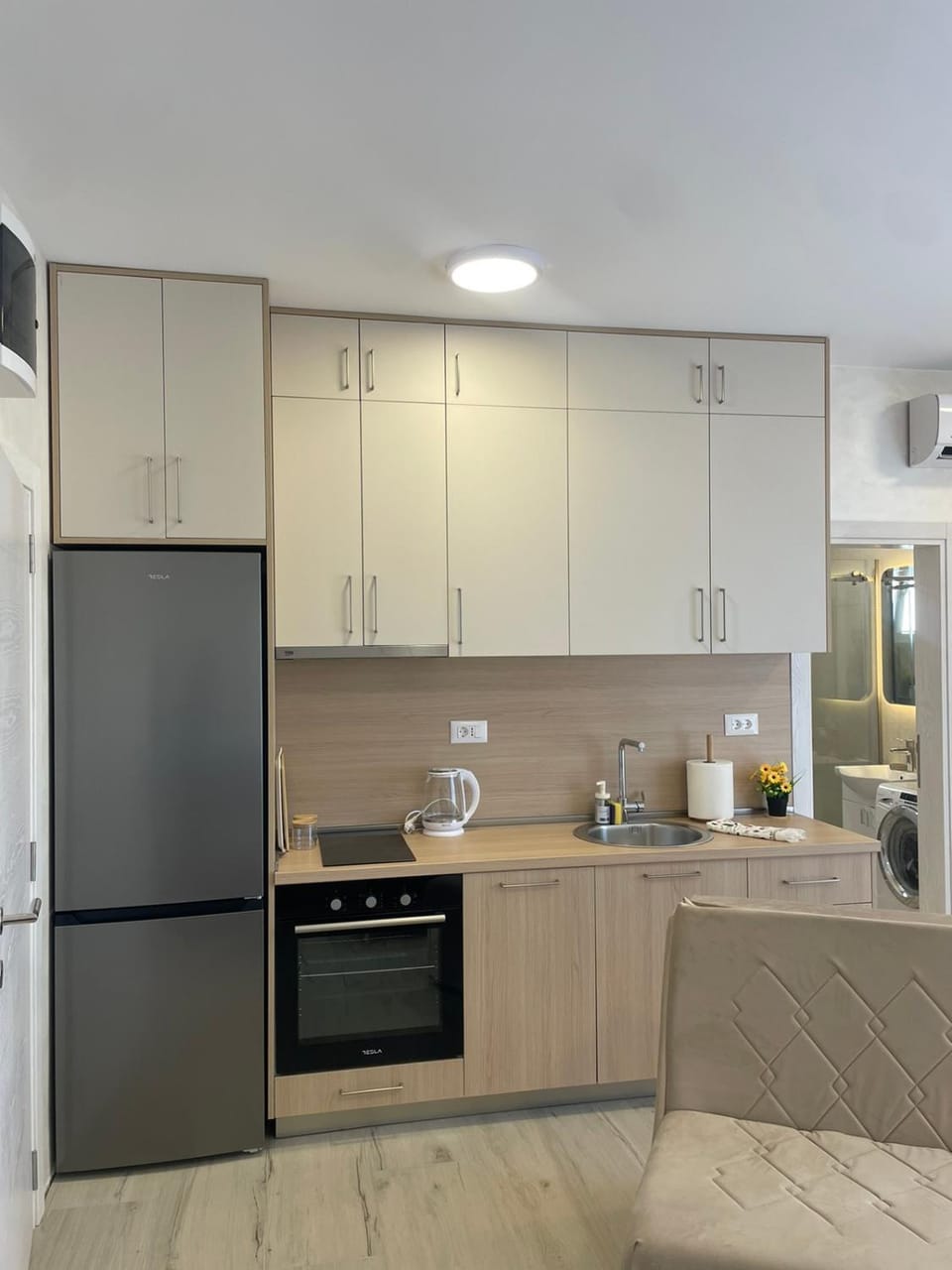 Kitchen or kitchenette, dishwasher, oven, stove