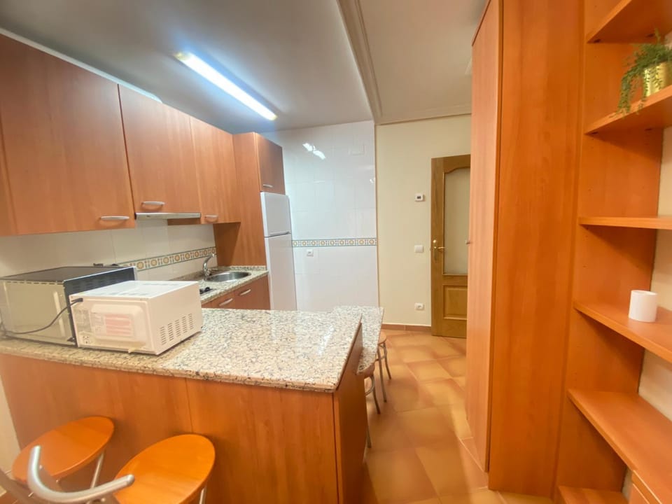 Kitchen or kitchenette, oven