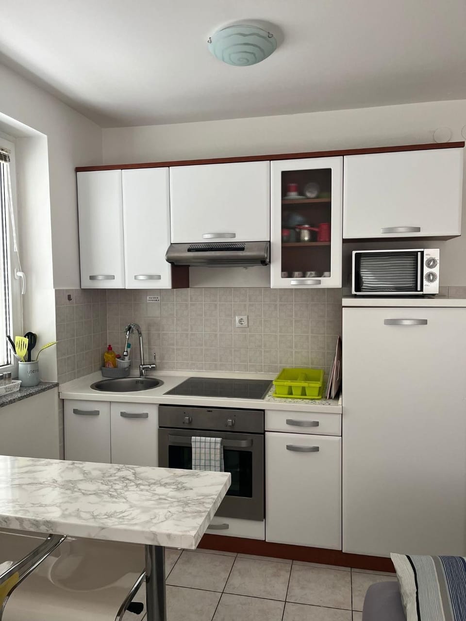 Kitchen or kitchenette, oven, stove
