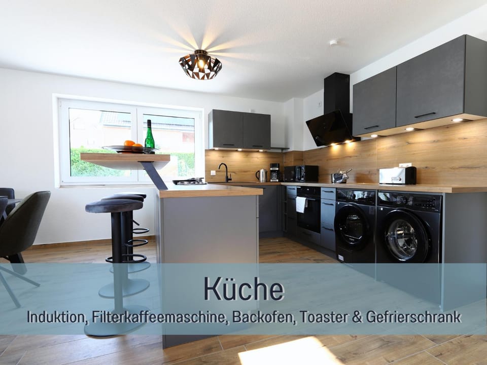 Kitchen or kitchenette, Facility for disabled guests, dishwasher, microwave, stove, stove, washing machine, washing machine, dryer, acessibility