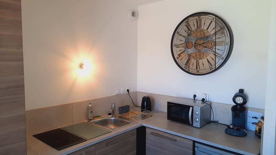 Kitchen or kitchenette, stove, kitchen