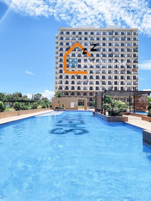 Property building, Pool view, Swimming pool, sunbed