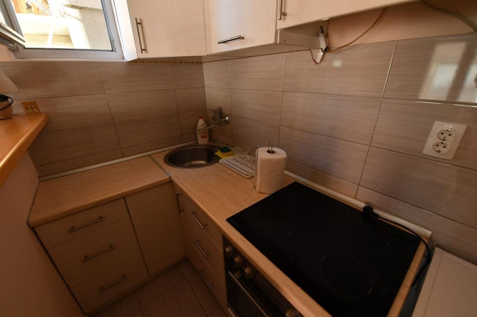 Kitchen or kitchenette, stove
