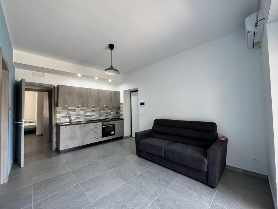 Kitchen or kitchenette, Living room, Seating area, oven, stove
