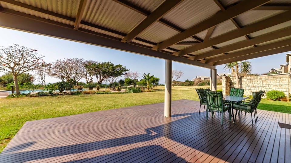 Property building, Patio, Spring, Day, Garden, View (from property/room), Balcony/Terrace, Dining area, Garden view