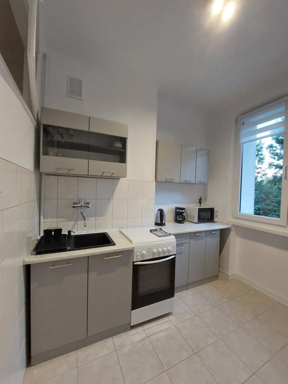 Kitchen or kitchenette, stove