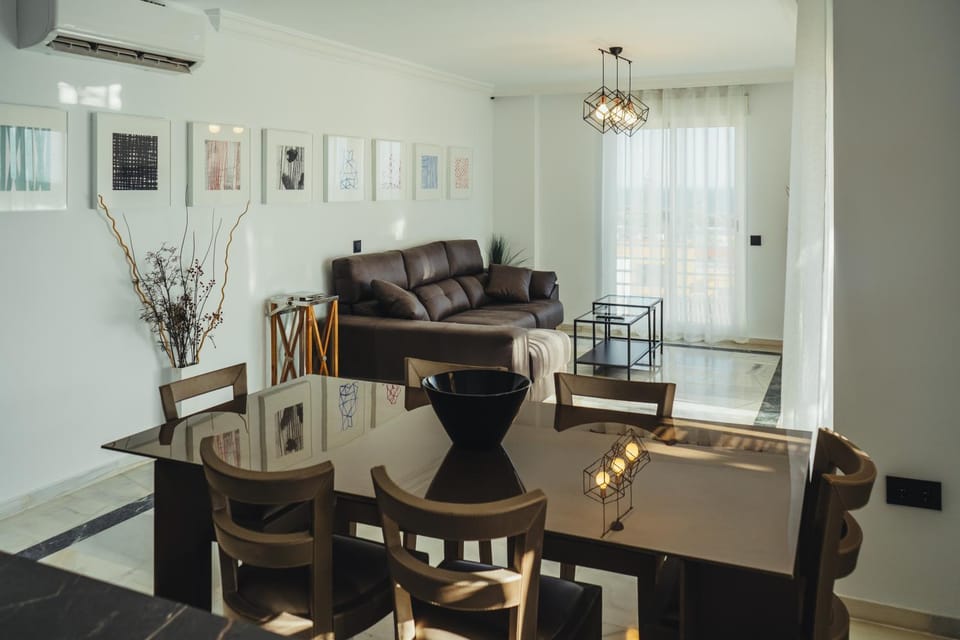 Communal lounge/ TV room, Living room, Seating area, Dining area, Sea view, air conditioner