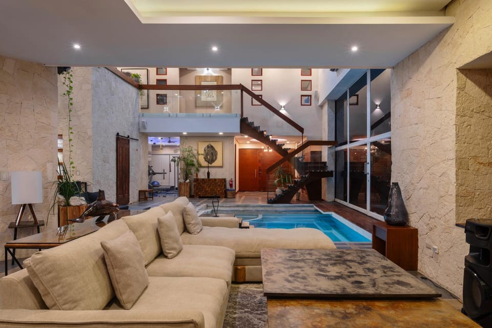 Living room, Seating area, Pool view