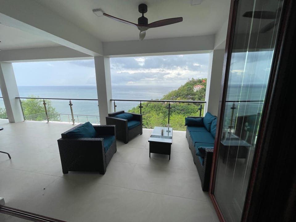 View (from property/room), Balcony/Terrace, Seating area, Sea view