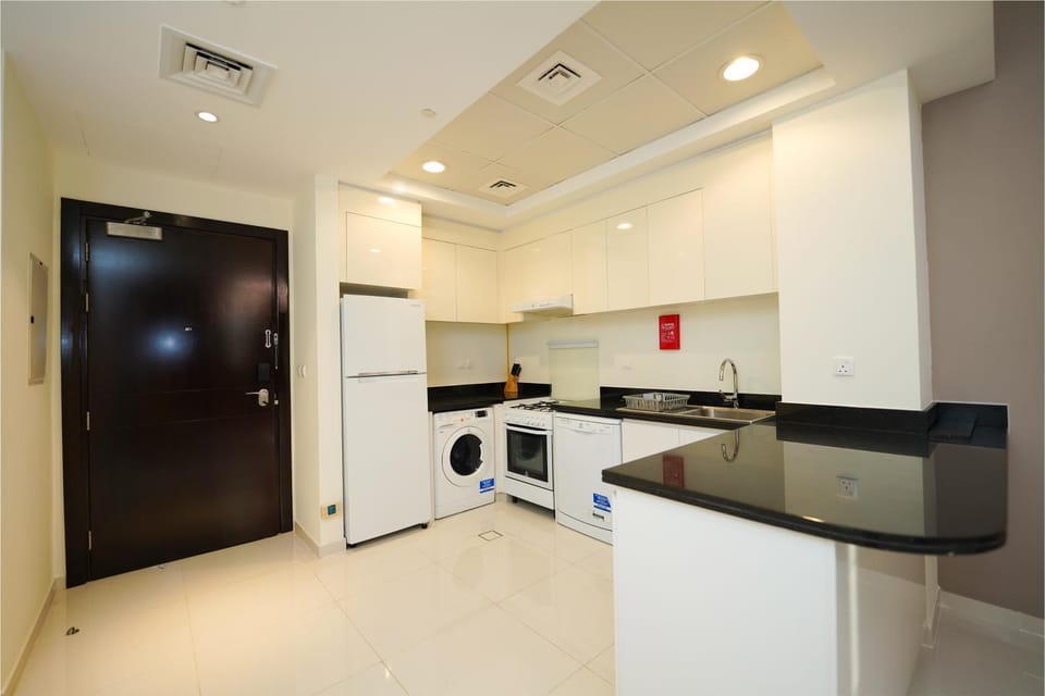 Kitchen or kitchenette, oven, stove, toaster