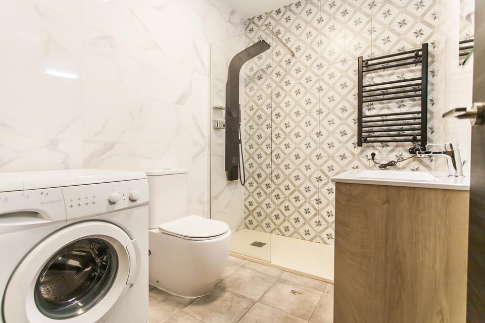 Shower, Toilet, Bath, towels, washing machine, dryer