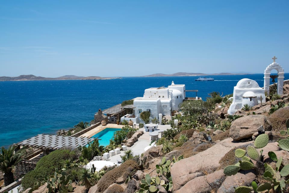 Property building, Nearby landmark, Day, Natural landscape, Beach, Pool view, Sea view, Swimming pool