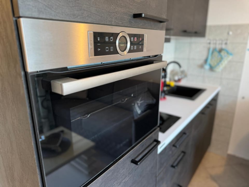 Kitchen or kitchenette, oven, stove