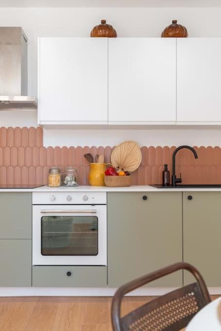 Kitchen or kitchenette, dishwasher, oven, stove