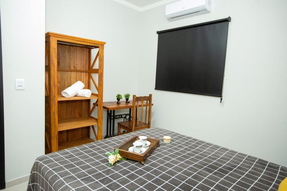 Bed, Photo of the whole room, Bedroom, towels, air conditioner