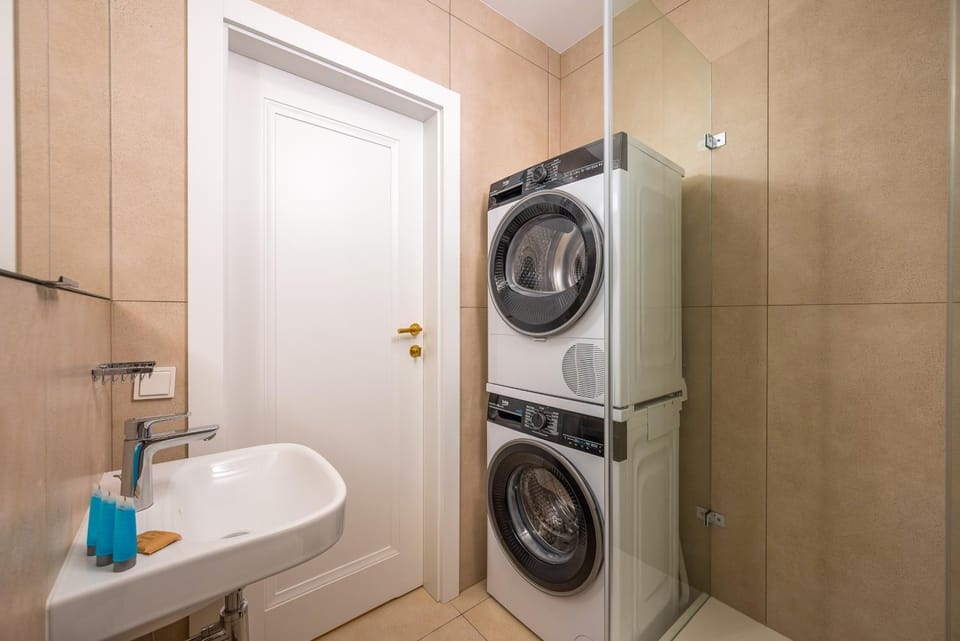Shower, Bathroom, towels, washing machine, dryer